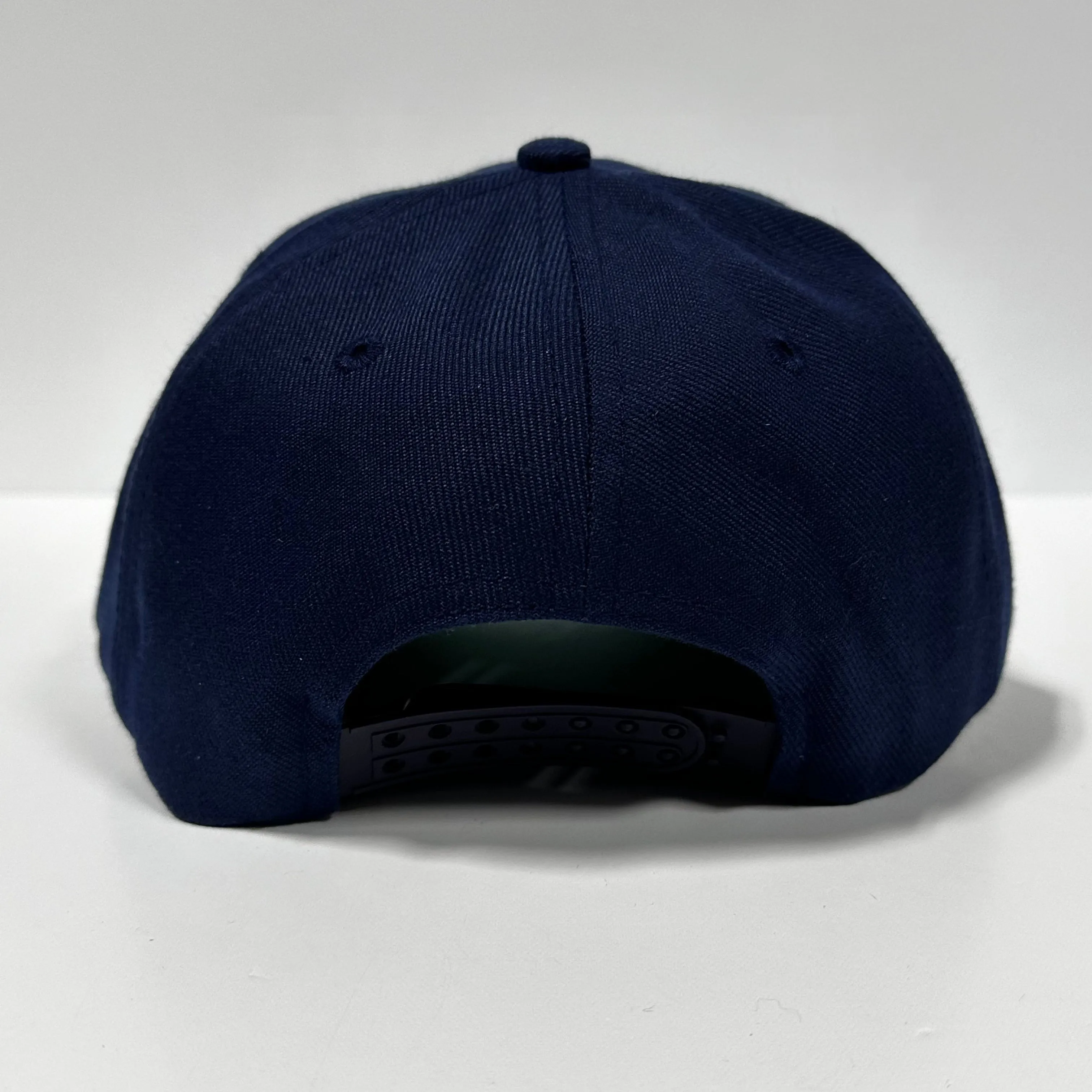 Sexi embroidered on a navy SnapBack Hat Cap Custom Embroidery