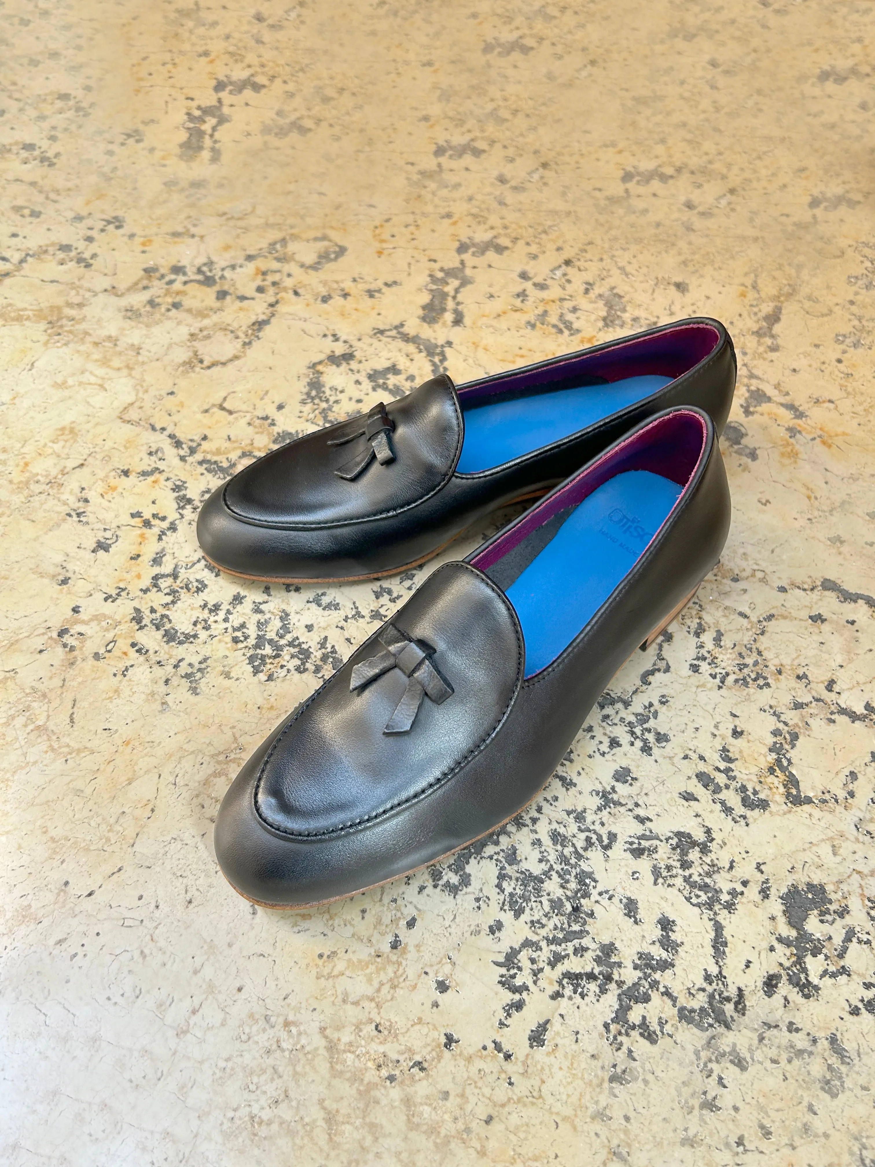 Slippers nere in pelle
