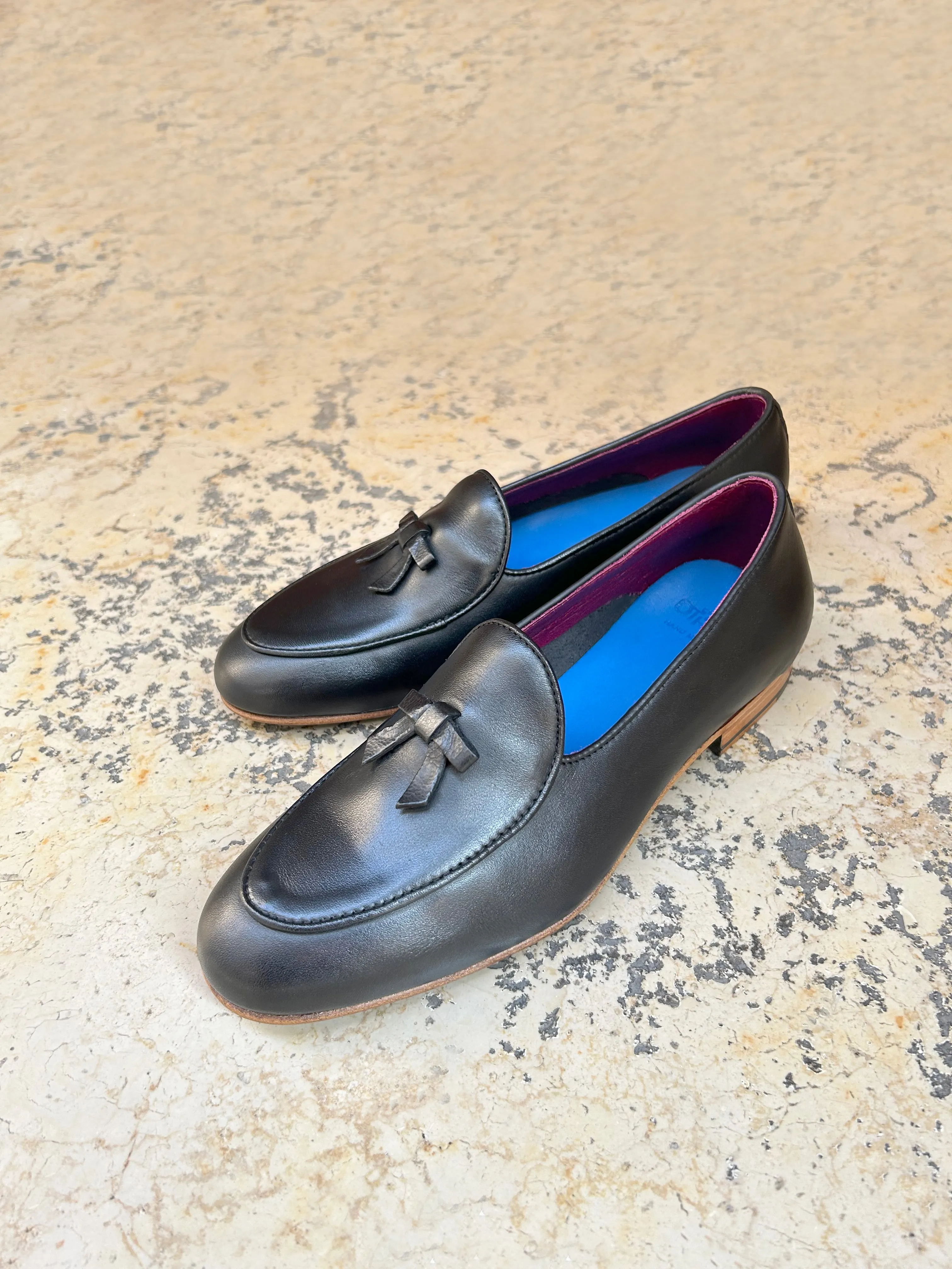 Slippers nere in pelle