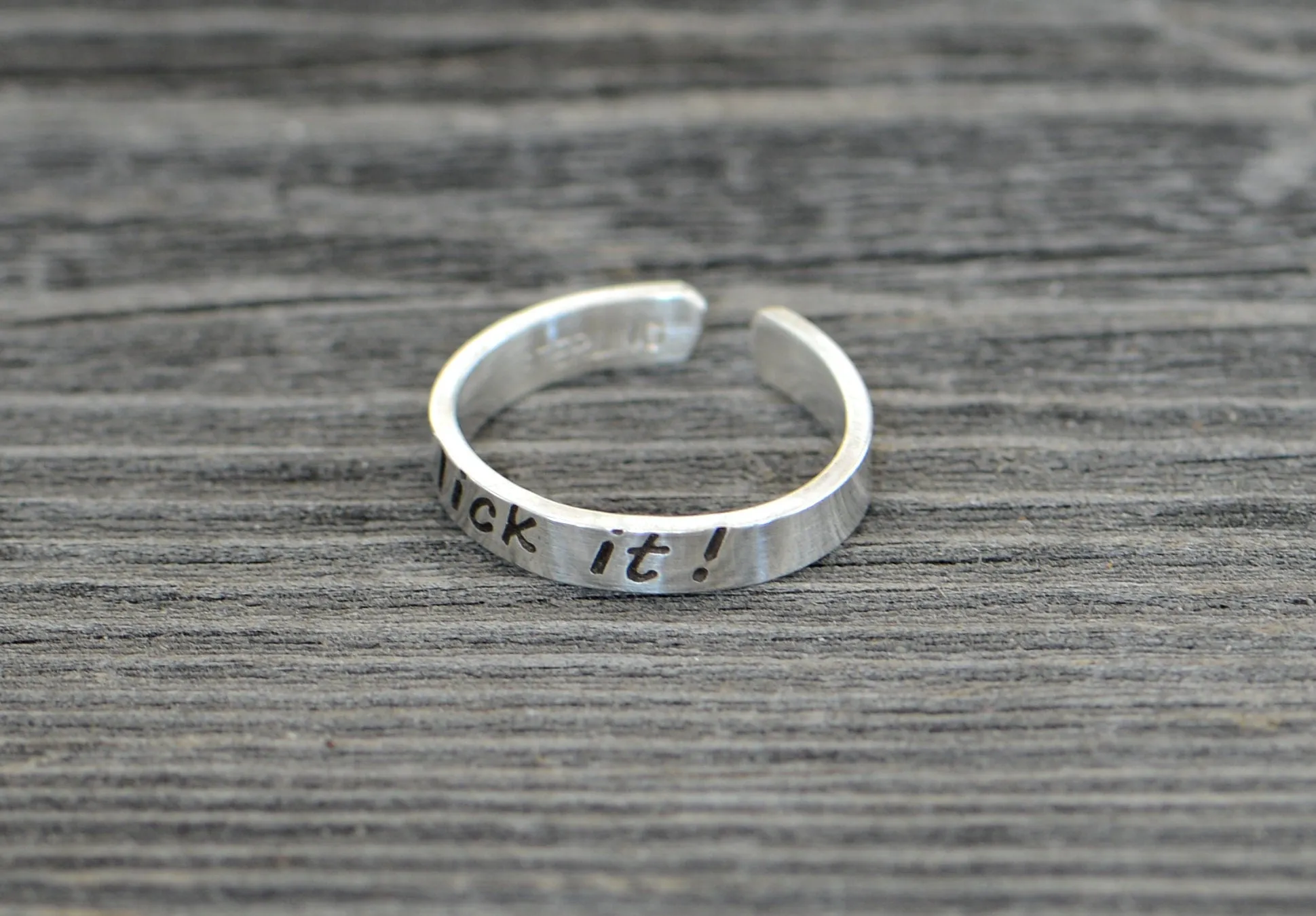 Sterling silver toe ring stamped with lick it
